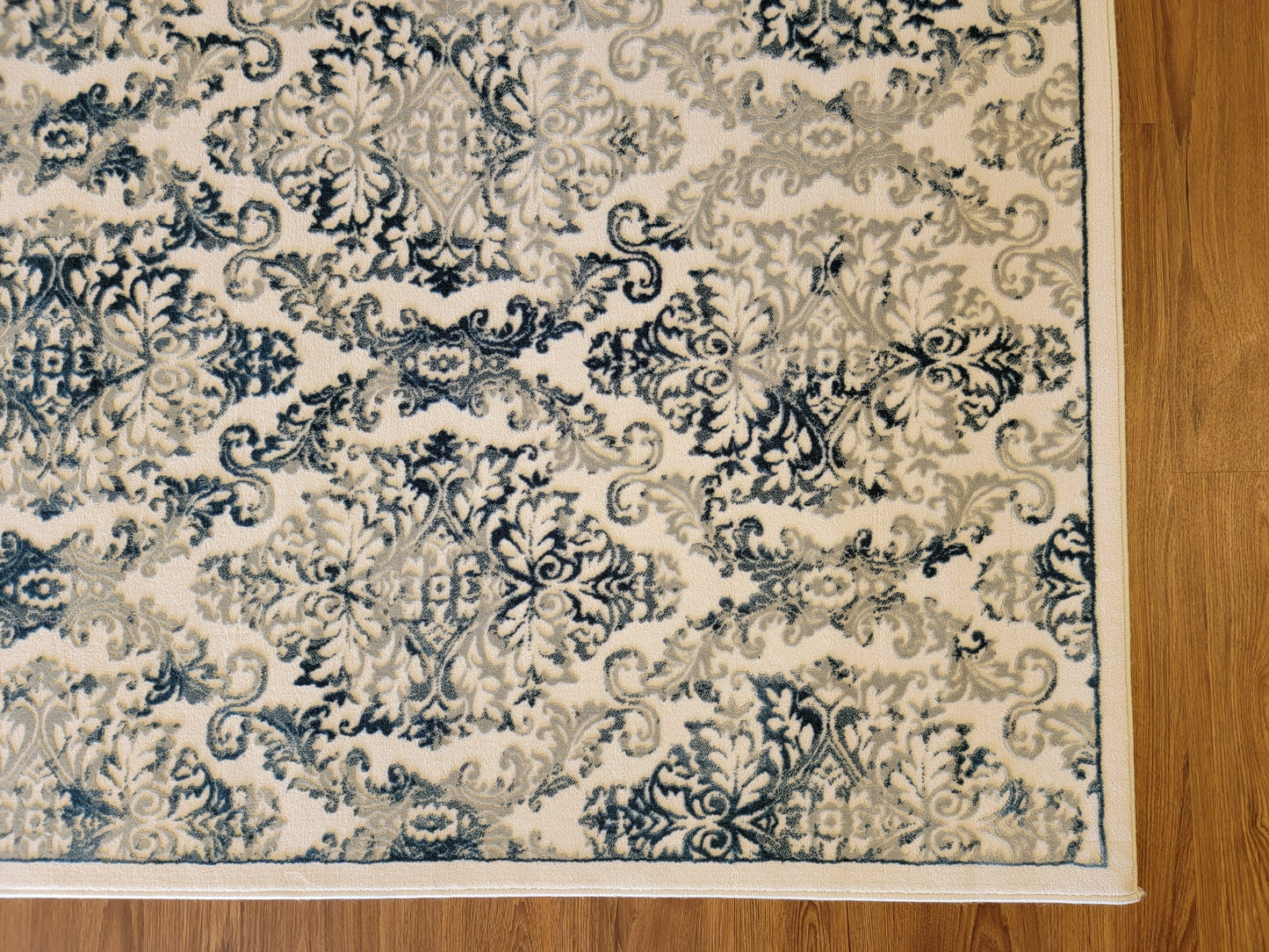 Airmont Damask Area Rug. Eggshell, Off-White, and Navy