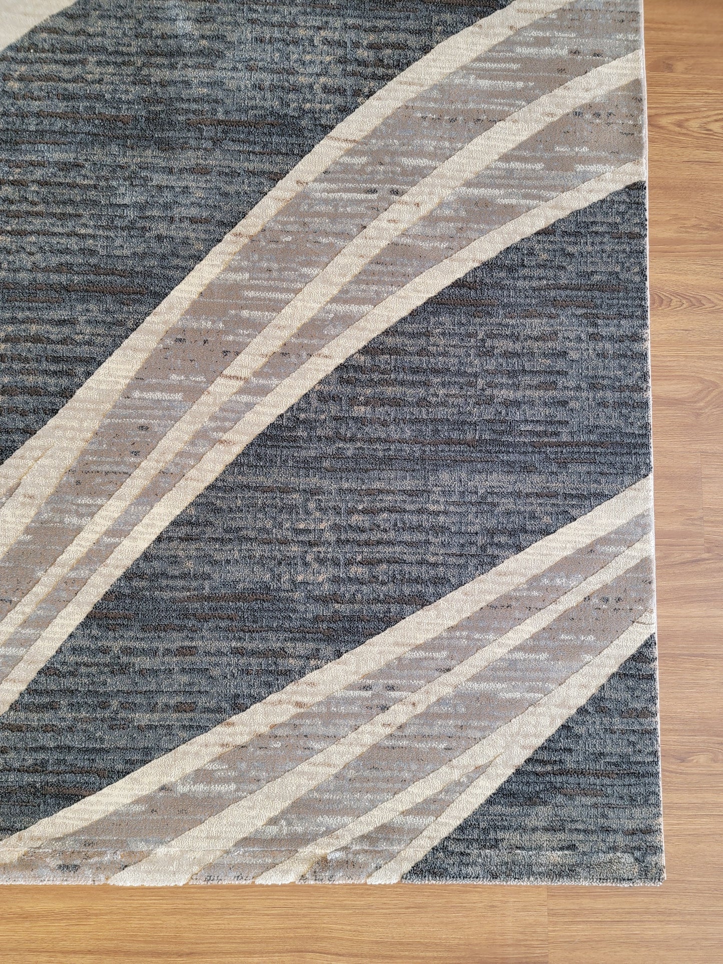 Baguette Abstract Area Rug. Charcoal and Blue with Curved Lines in Beige