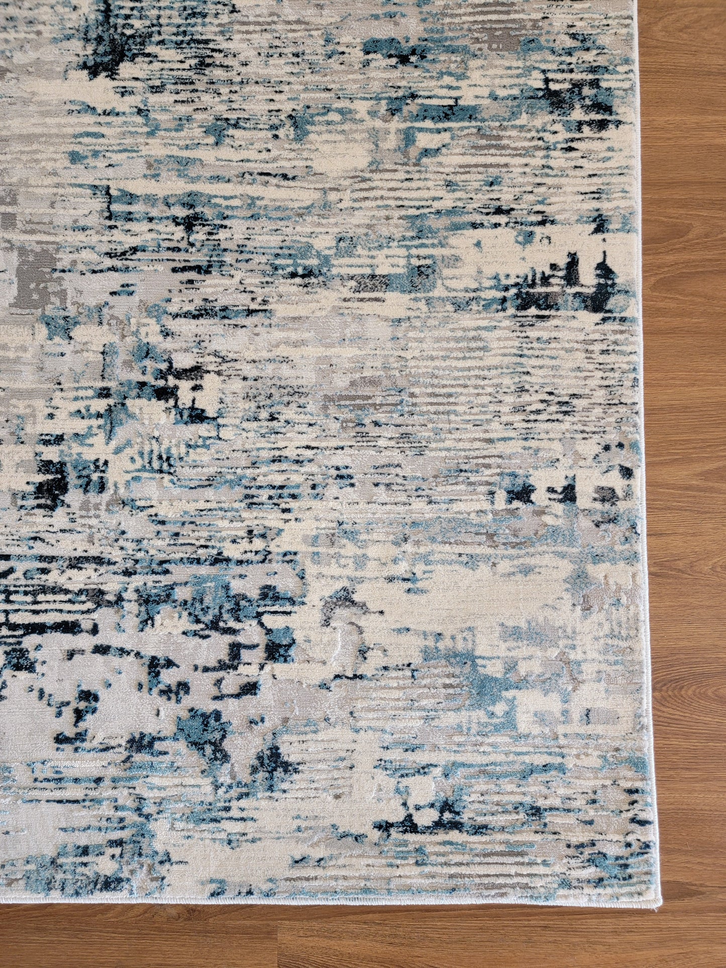 Cozy Abstract Area Rug. White, Gray, and Navy Blue
