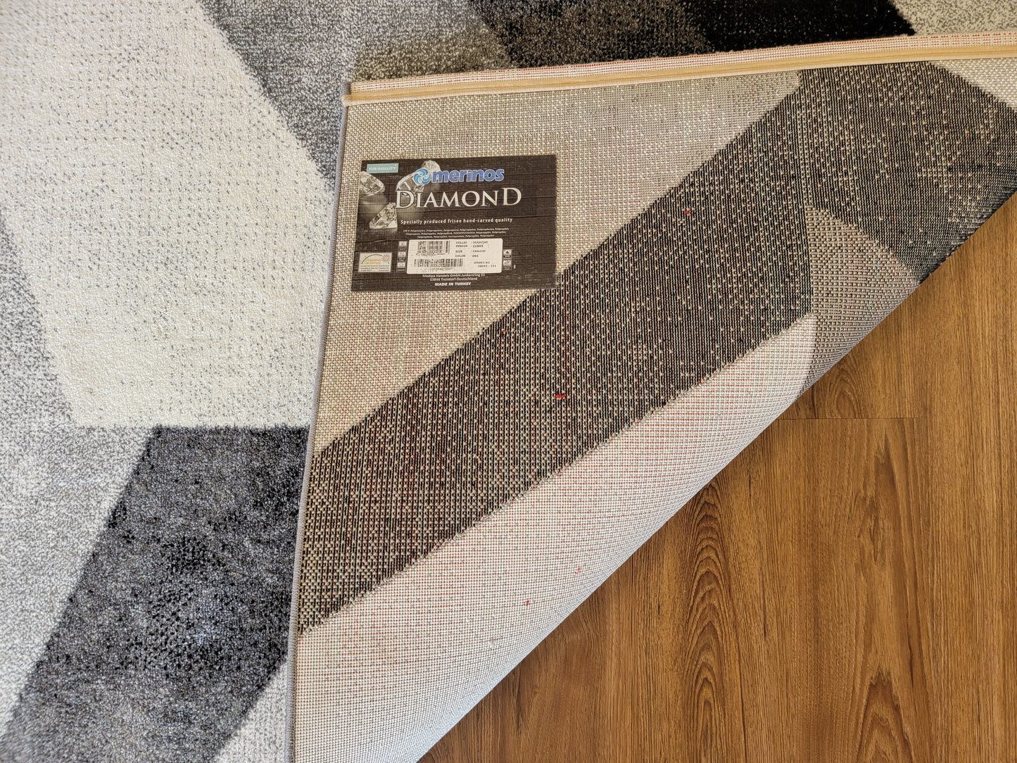 Diamond Geometric Area Rug. Black, Ash Gray, and Metallic Gray
