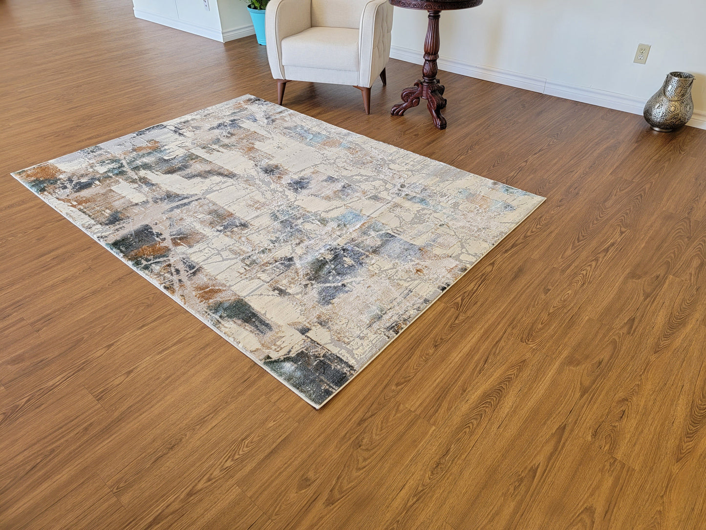 Emojy Abstract Area Rug. Cream, Light Gray, and Light Blue
