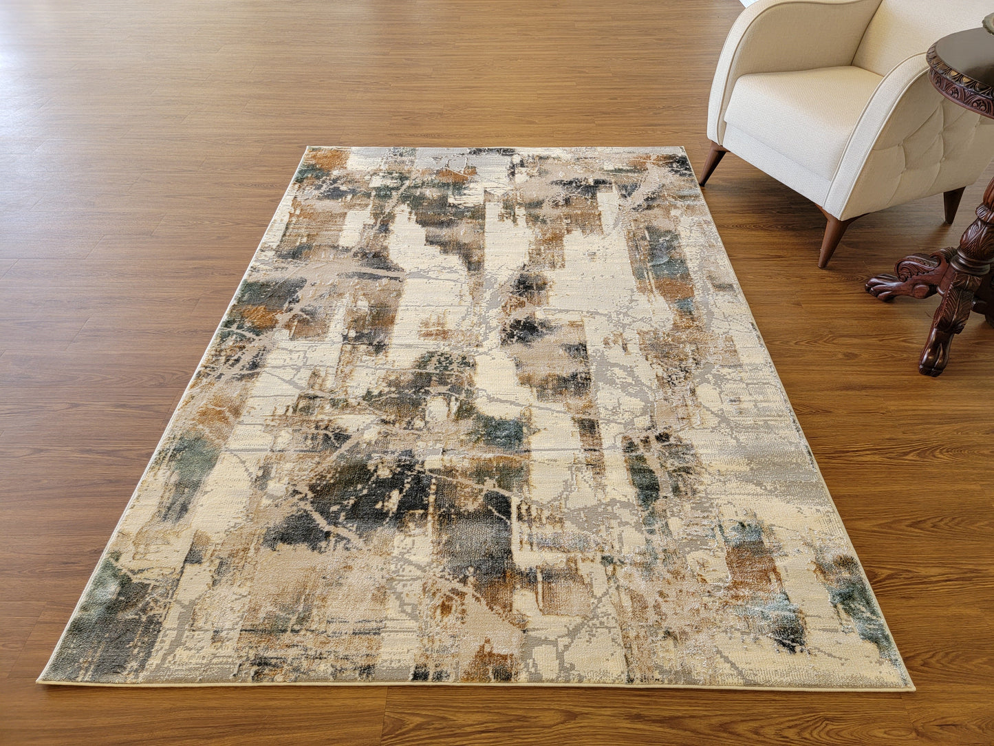 Emojy Abstract Area Rug. Cream, Light Gray, and Light Blue