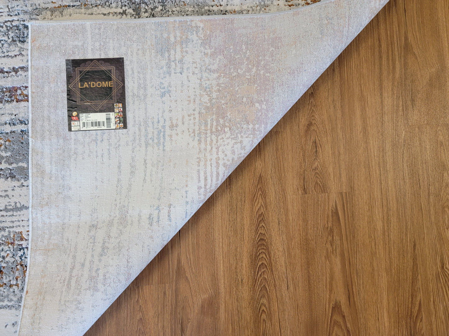 LaDome Abstract Area Rug. White and Light Gray with Lilac and Gold Touches