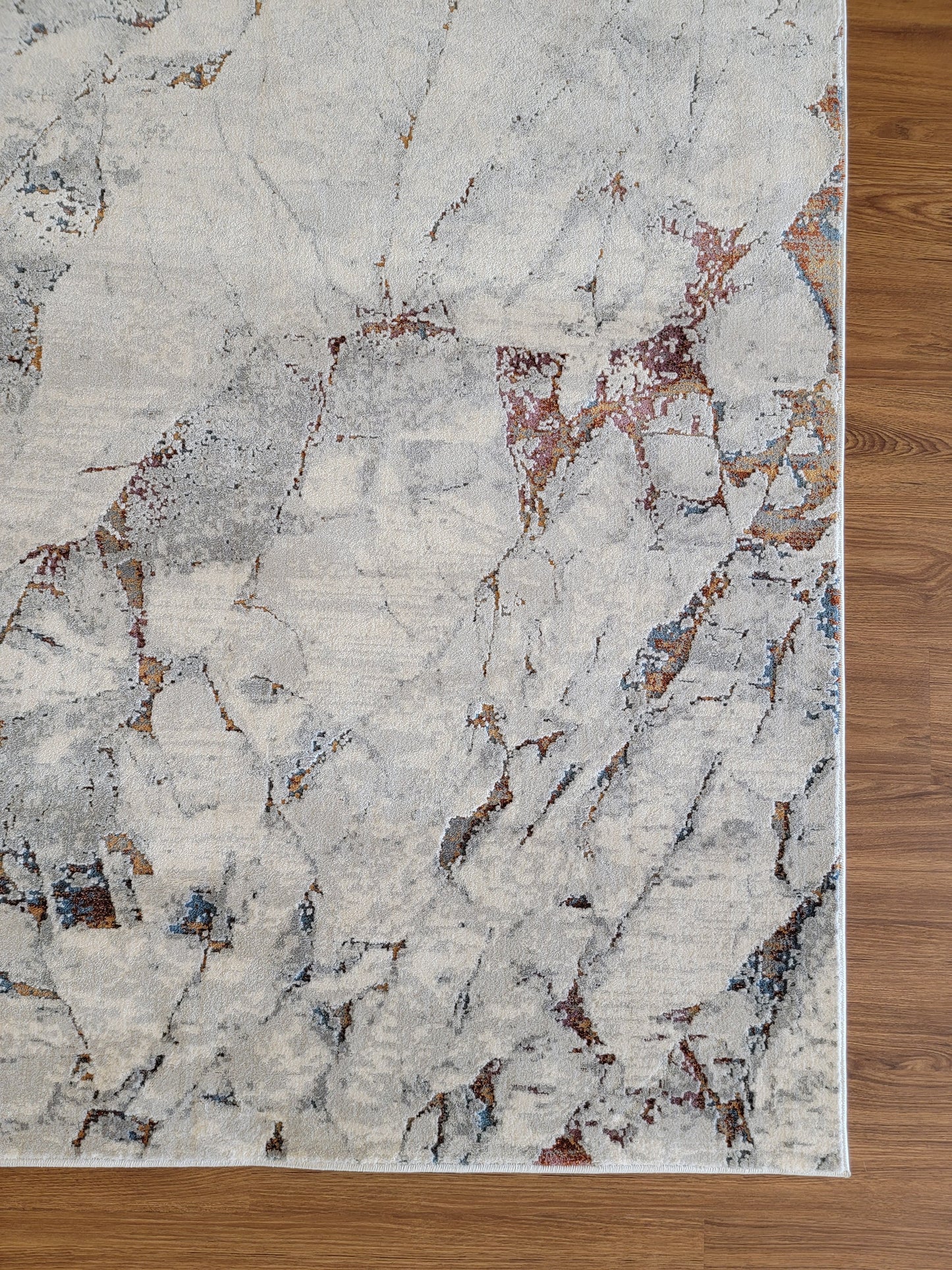 LaDome Abstract Area Rug. Platinum, Slate Gray, and Copper