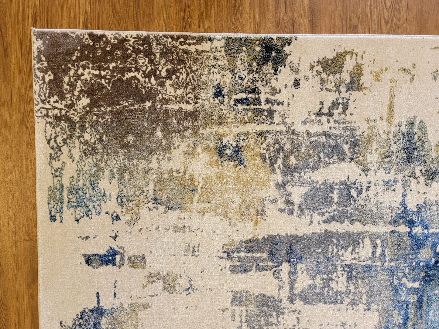 Olimpos Abstract Area Rug. Beige, Cobalt Blue, and Golden Brown