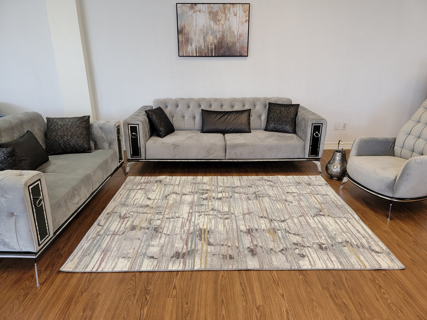 Revero Abstract Area Rug. Ivory, Gold, Gray, and Teal Blue