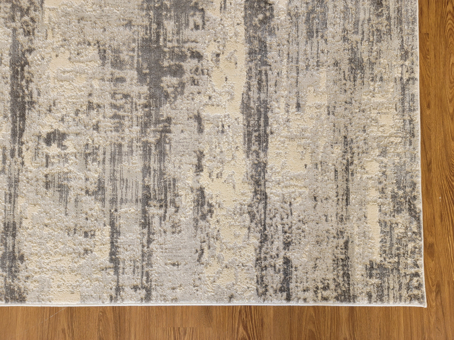 Cozy Abstract Area Rug. Cream, Light Gray, and Slate Gray