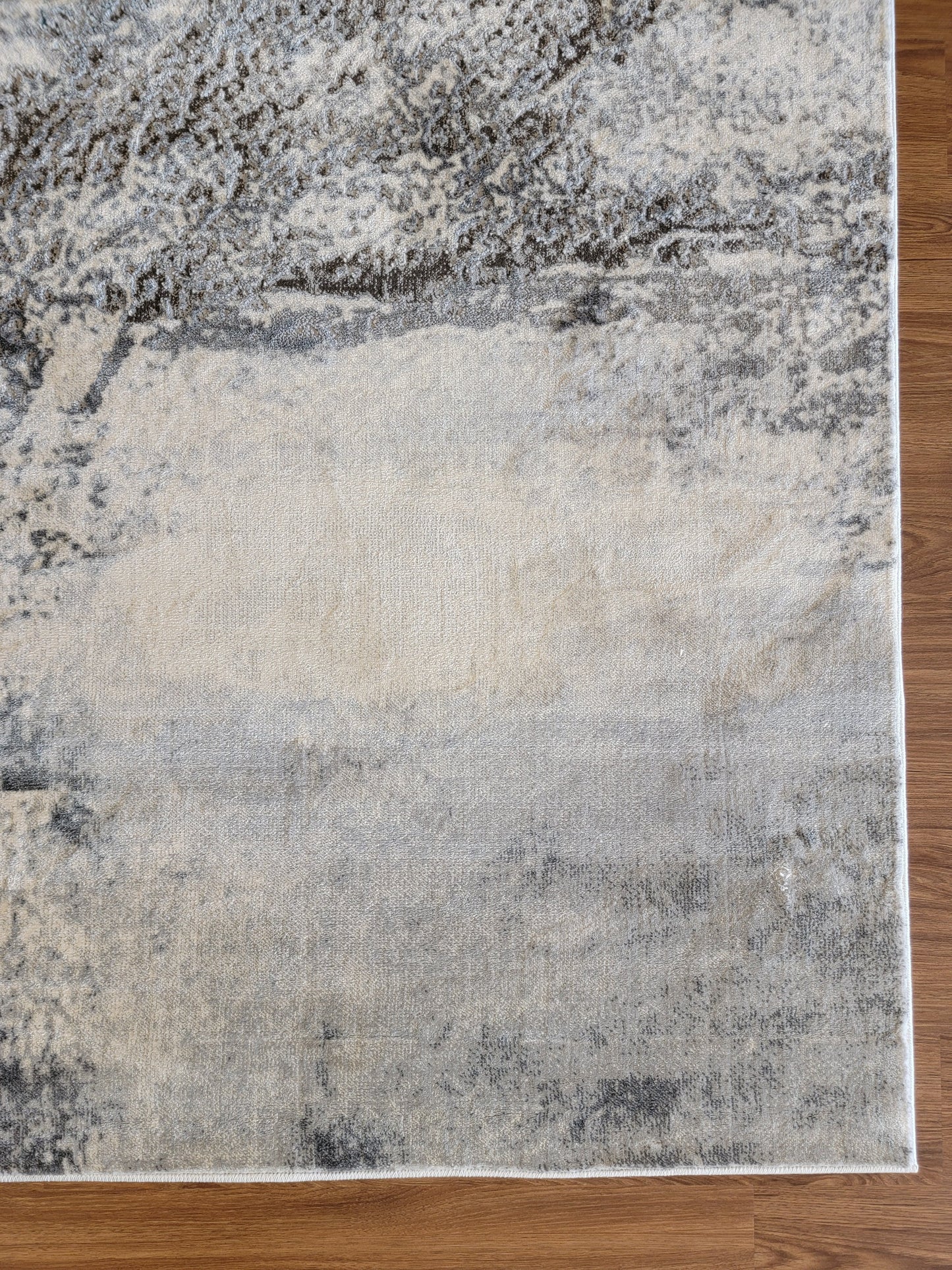 Cozy Abstract Area Rug. Cream, Light Blue, and Slate Gray