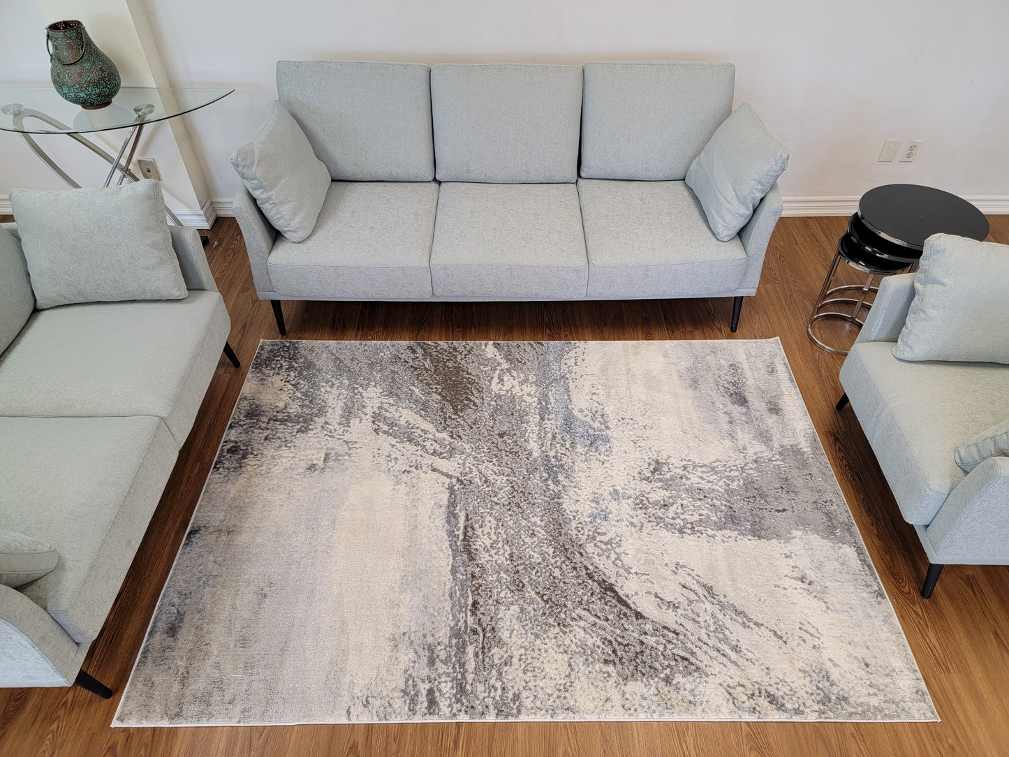 Cozy Abstract Area Rug. Cream, Light Blue, and Slate Gray