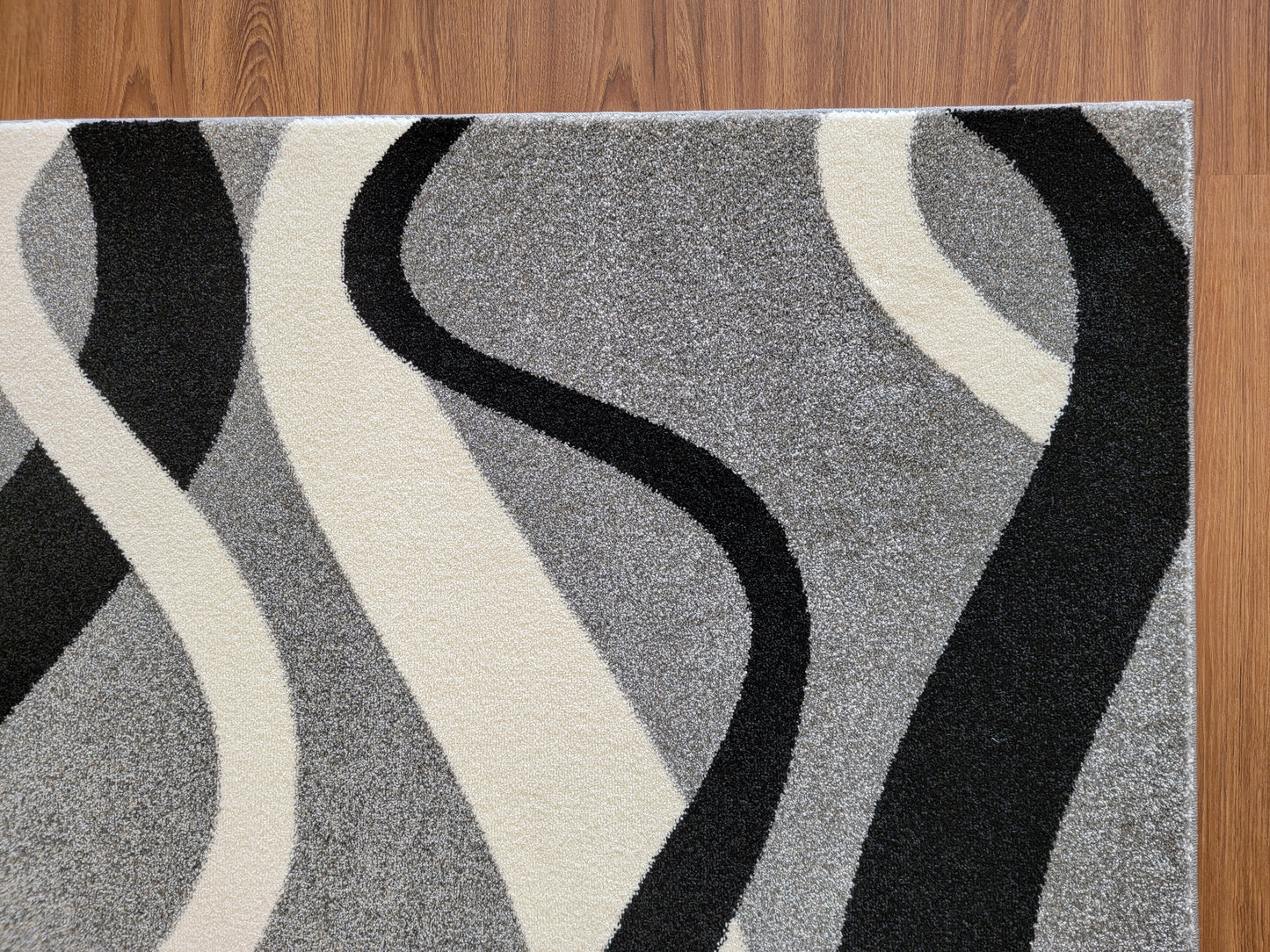 Diamond Abstract Area Rug. Ash Gray with Curved Lines in Black and White