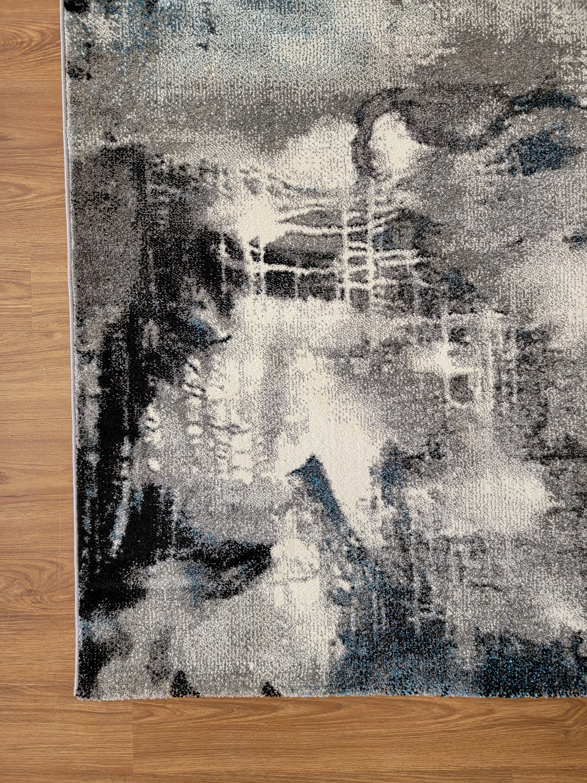 Diamond Art Abstract Area Rug. White, Gray, and Black  corner