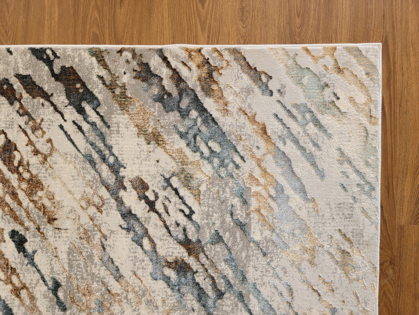 Emojy Abstract Area Rug. Gray, Blue, and Copper