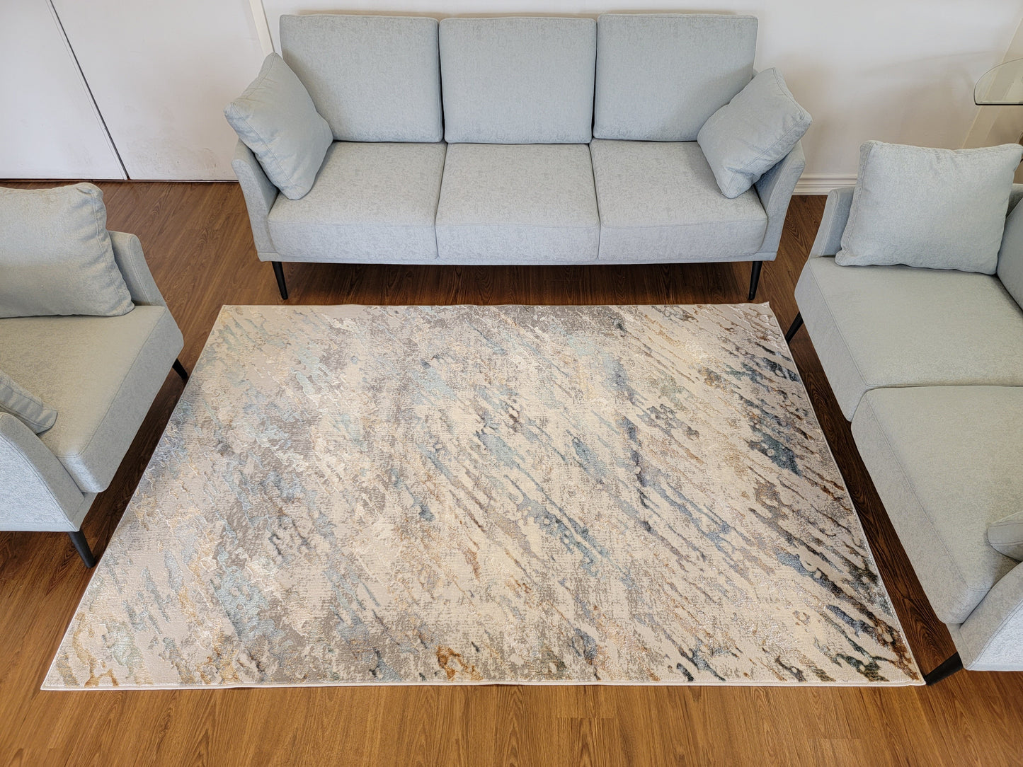 Emojy Abstract Area Rug. Gray, Blue, and Copper