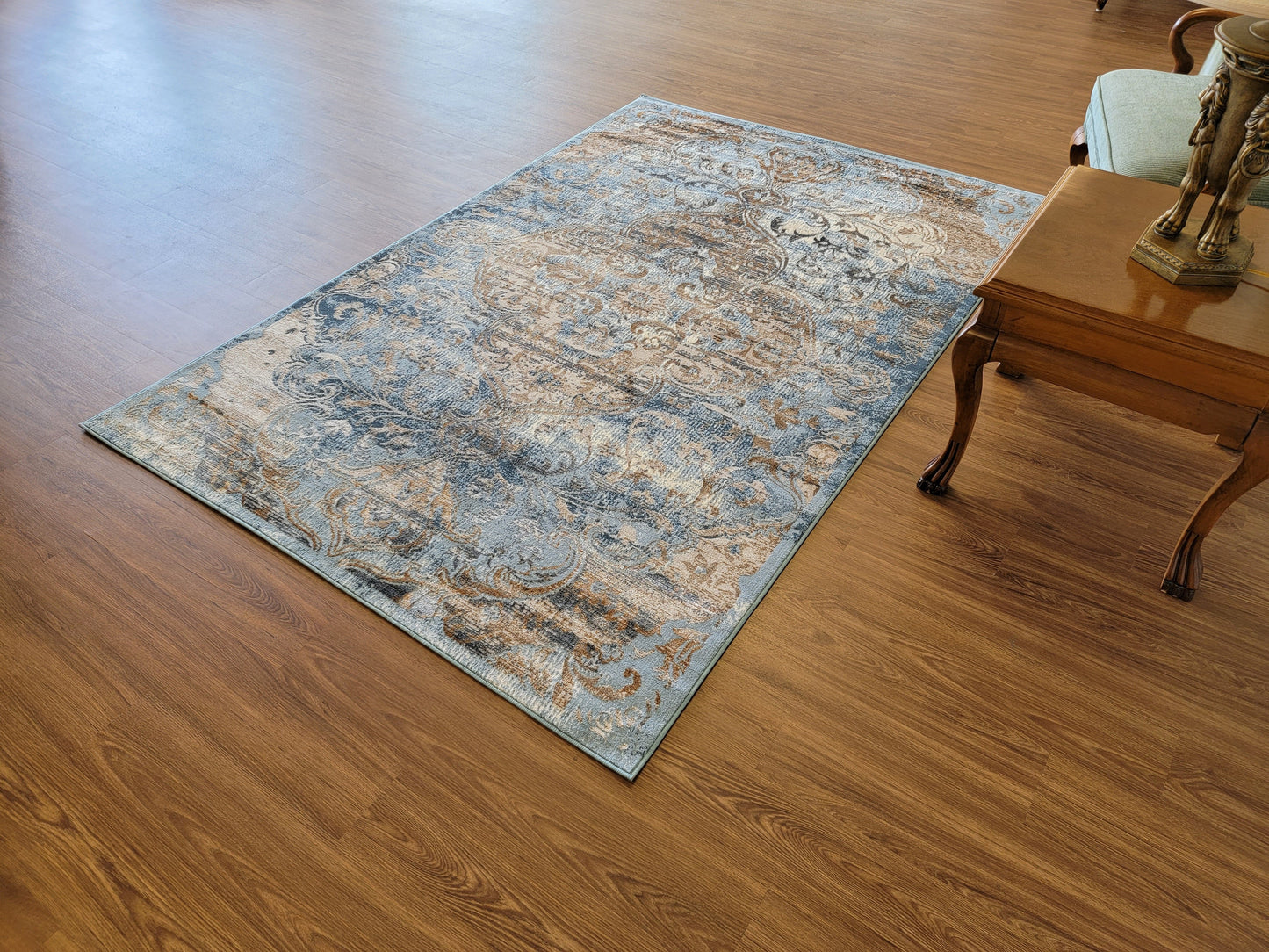 Emojy Modern Traditional Area Rug. Cream, Tan Brown, and Blue