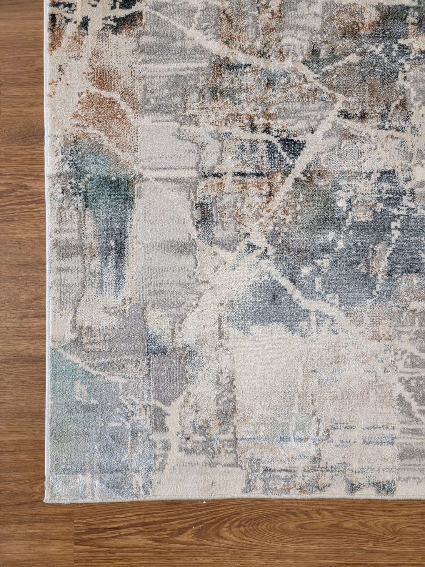 Emojy Abstract Area Rug. Beige, Brown, and Blue