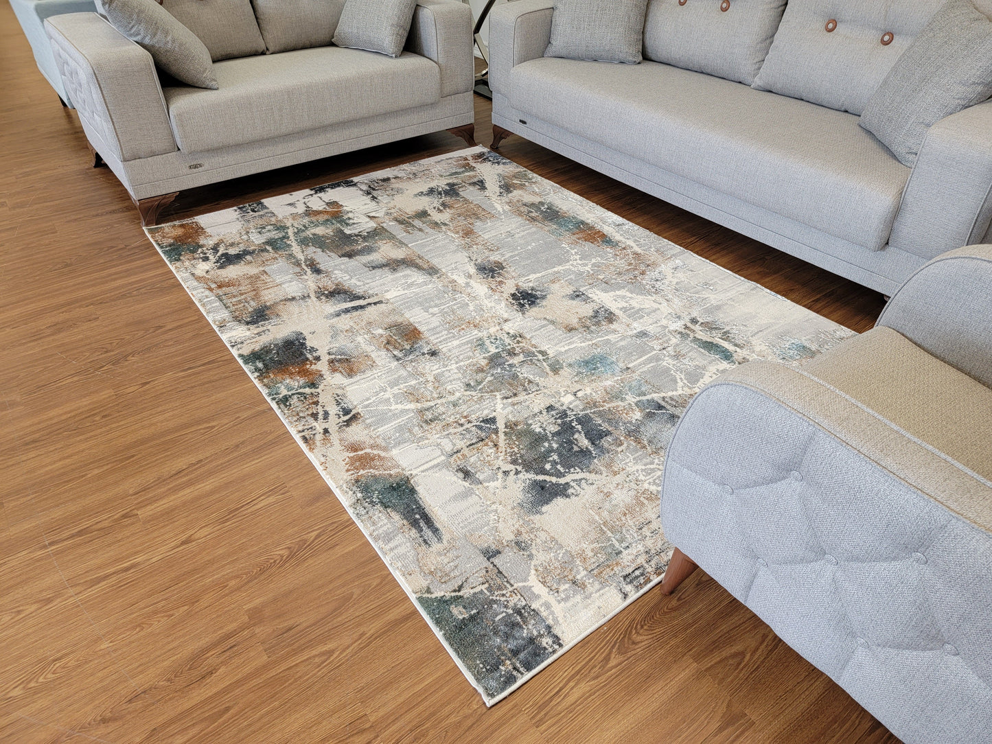 Emojy Abstract Area Rug. Beige, Brown, and Blue