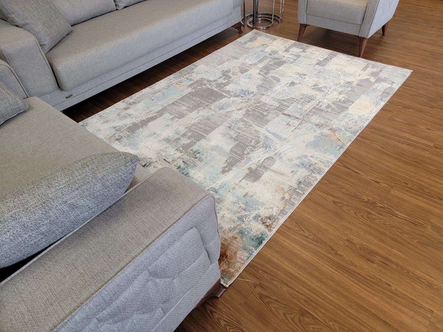 Emojy Abstract Area Rug. Beige, Brown, and Blue