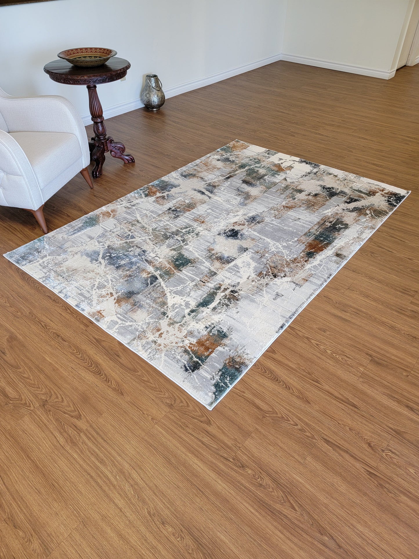 Emojy Abstract Area Rug. Beige, Brown, and Blue