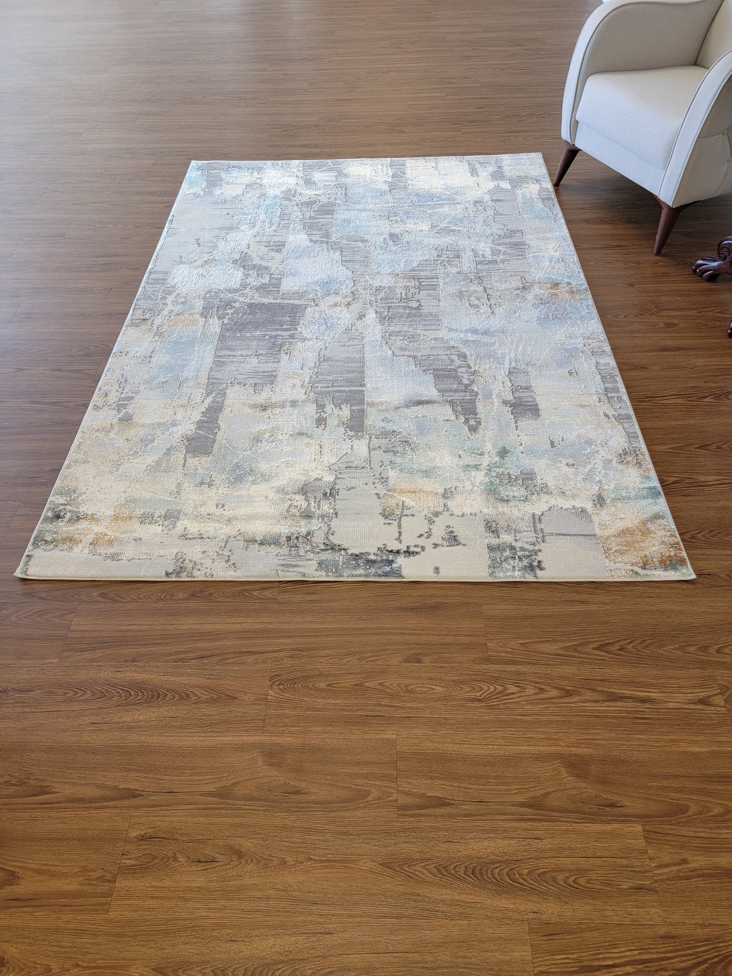 Emojy Abstract Area Rug. Beige, Brown, and Blue