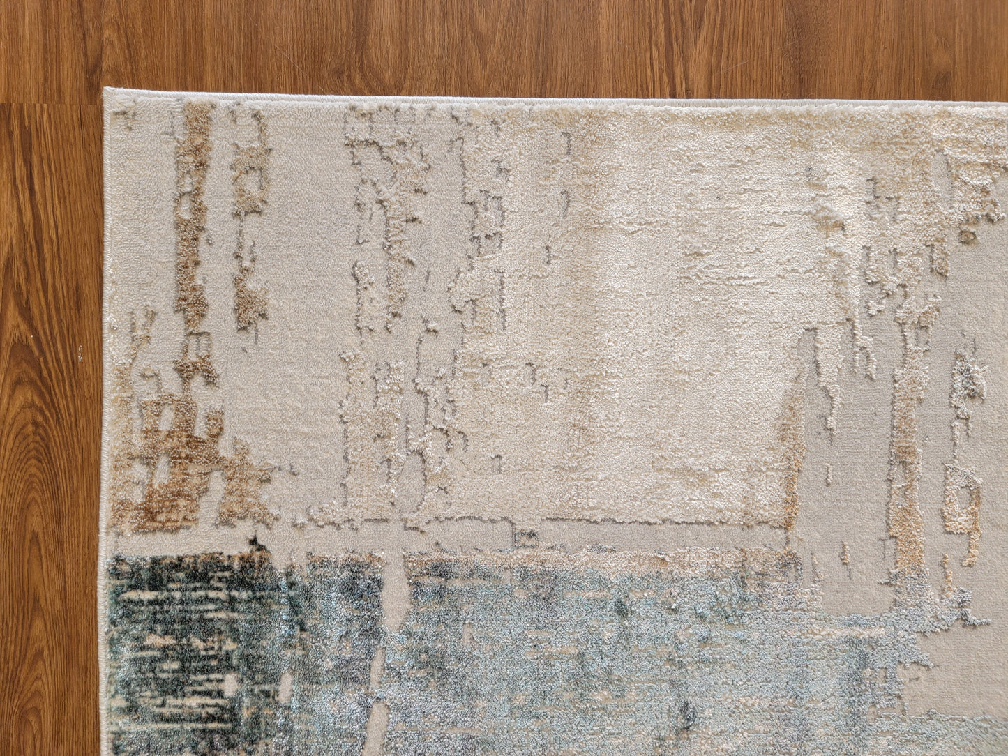 Emojy Abstract Area Rug. Cream, Ash Gray, and Light Brown