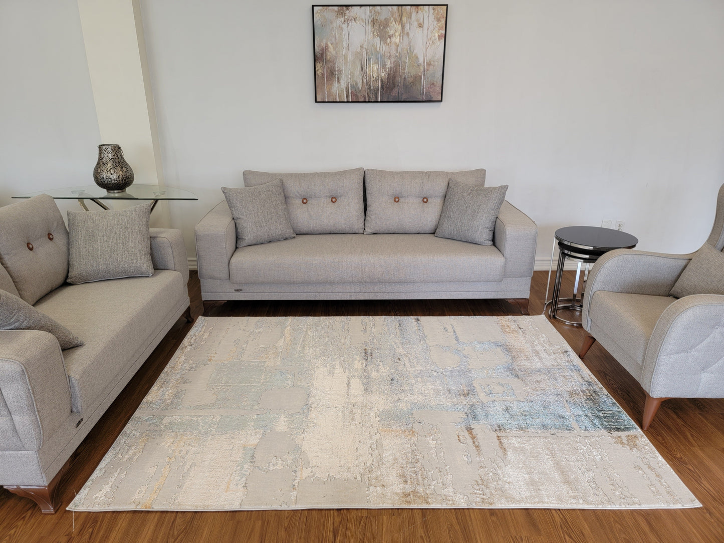 Emojy Abstract Area Rug. Cream, Ash Gray, and Light Brown