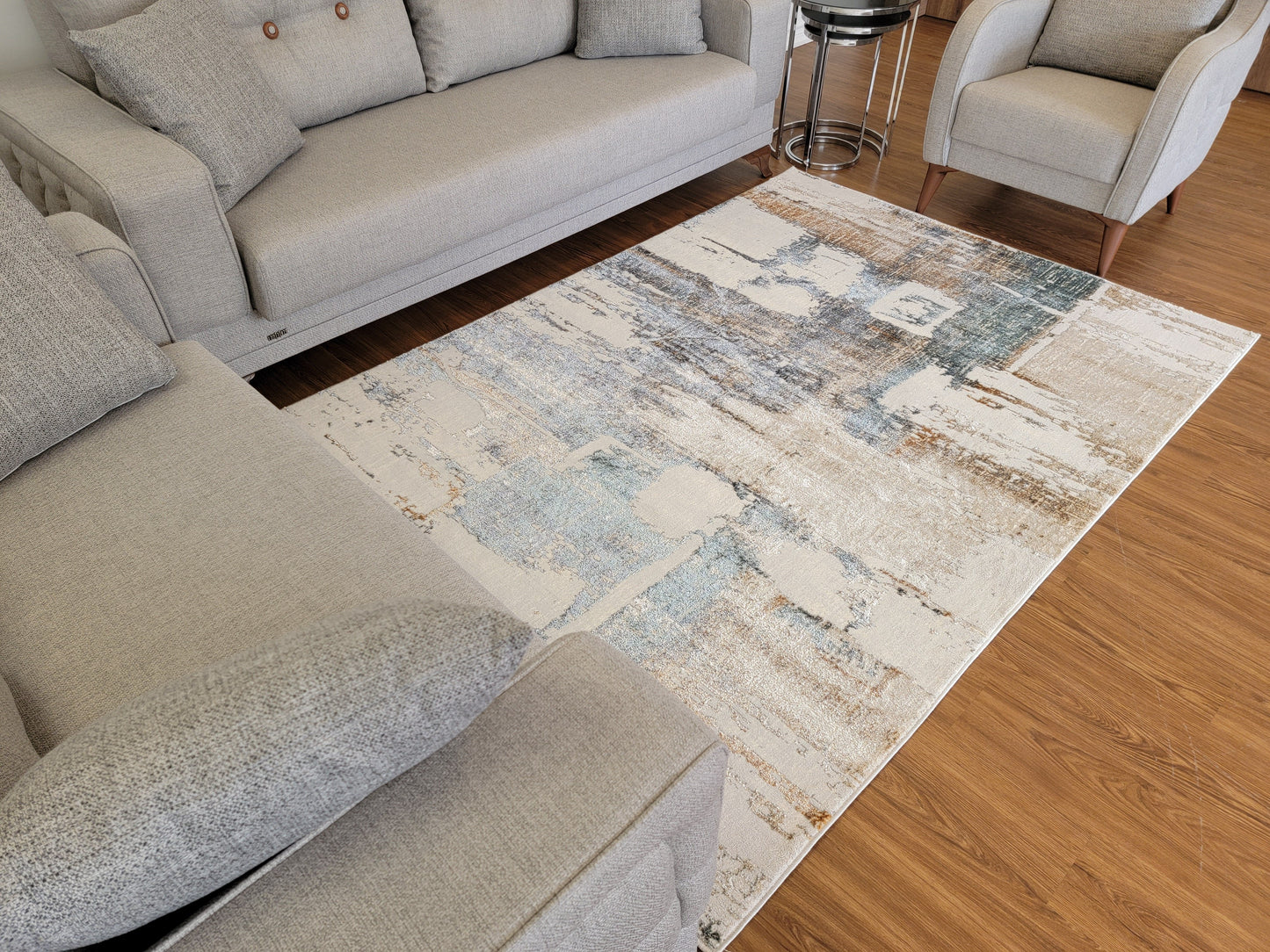 Emojy Abstract Area Rug. Cream, Ash Gray, and Light Brown