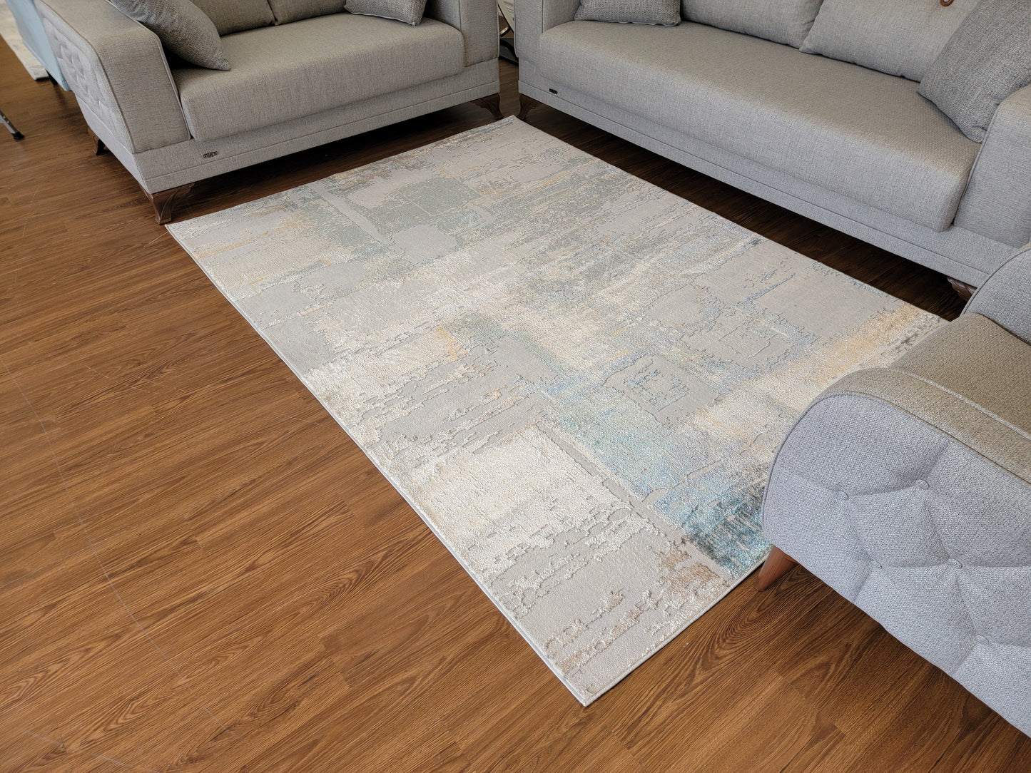 Emojy Abstract Area Rug. Cream, Ash Gray, and Light Brown