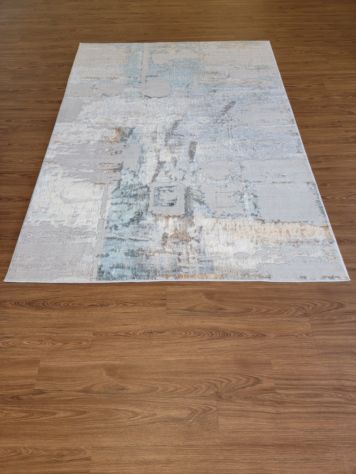 Emojy Abstract Area Rug. Cream, Ash Gray, and Light Brown