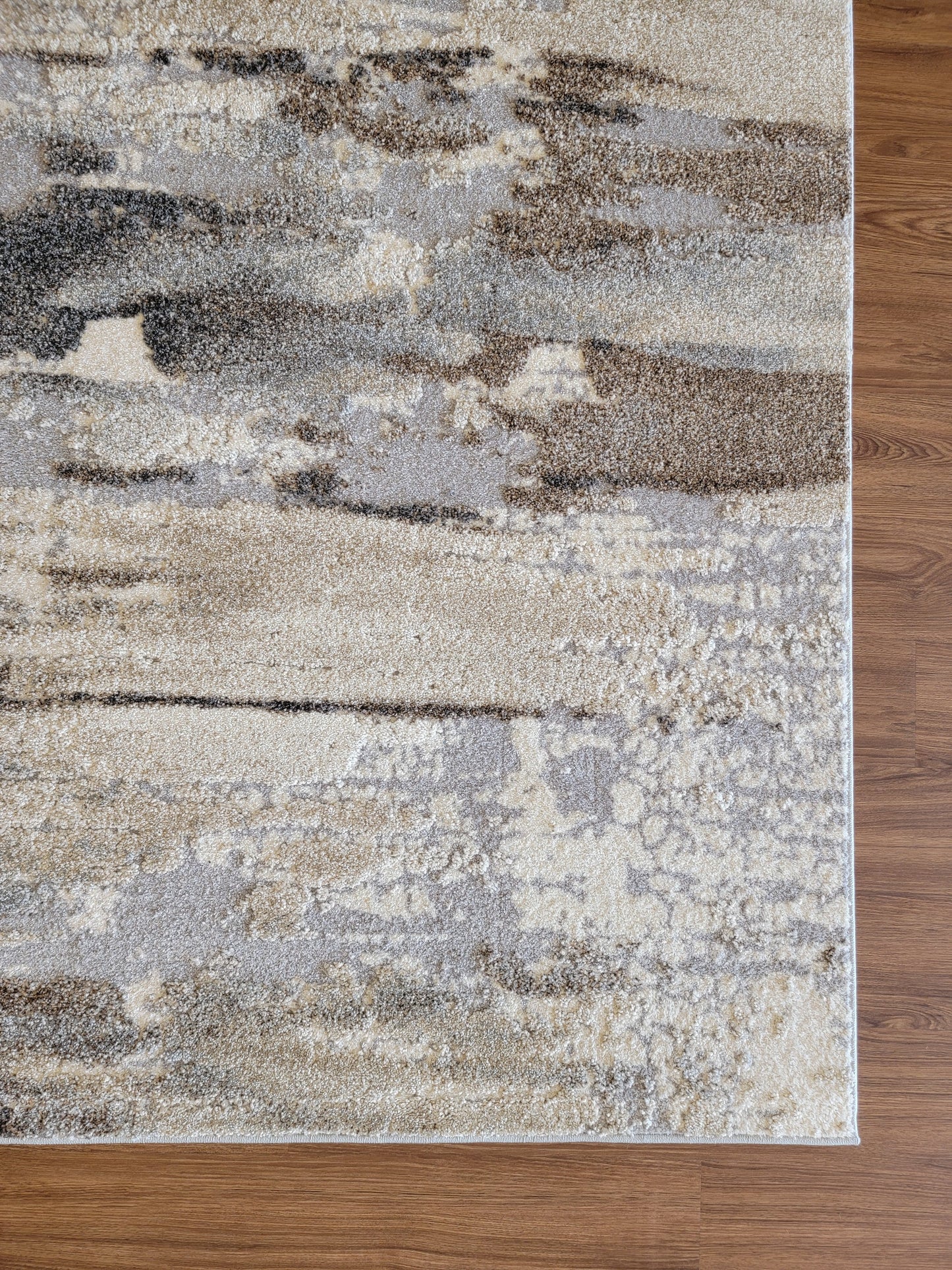Ibiza Abstract Area Rug. Beige, Brown, and Silver