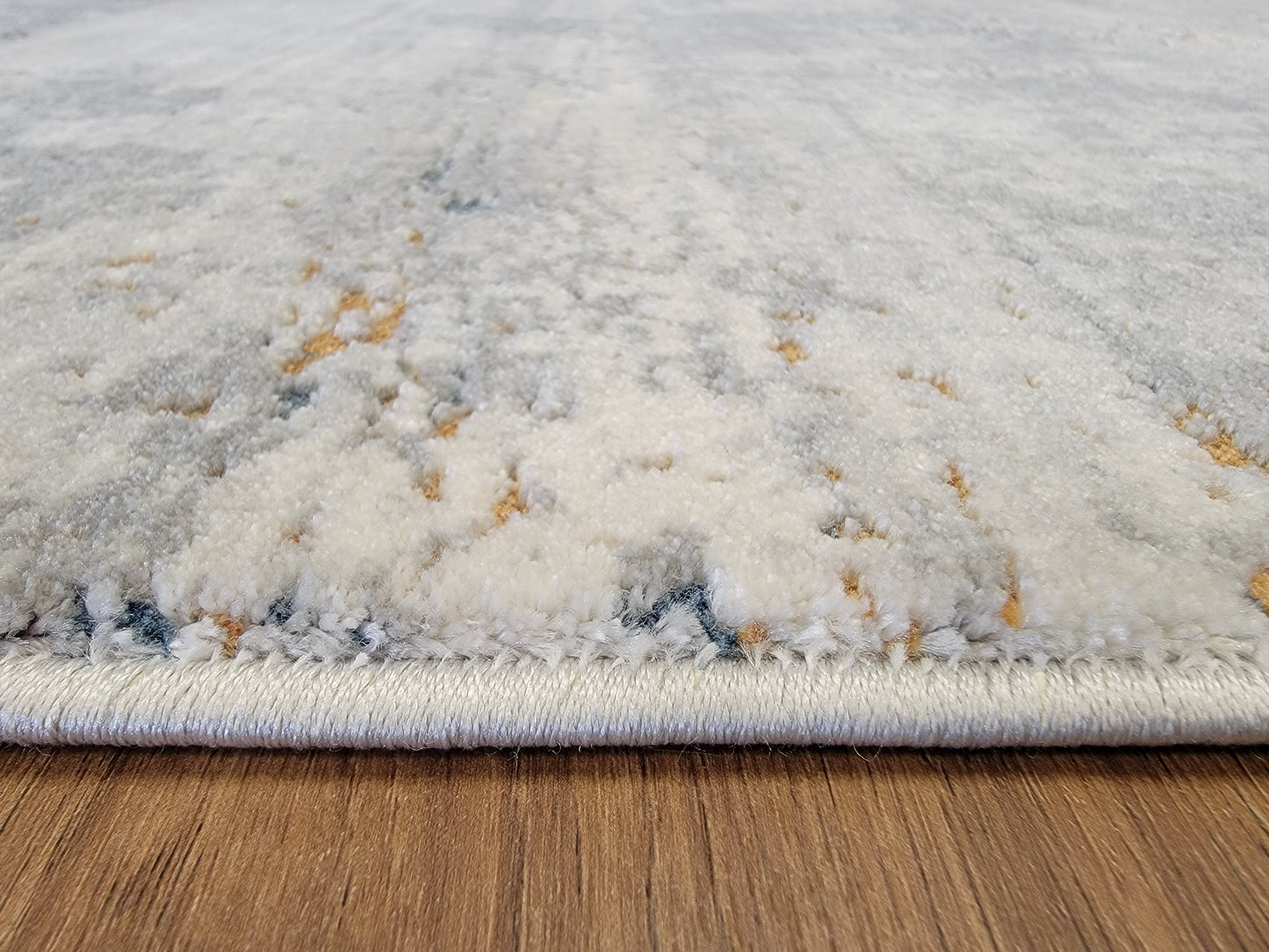LaDome Abstract Area Rug. White, and Gray with Tiny Lilac Patches