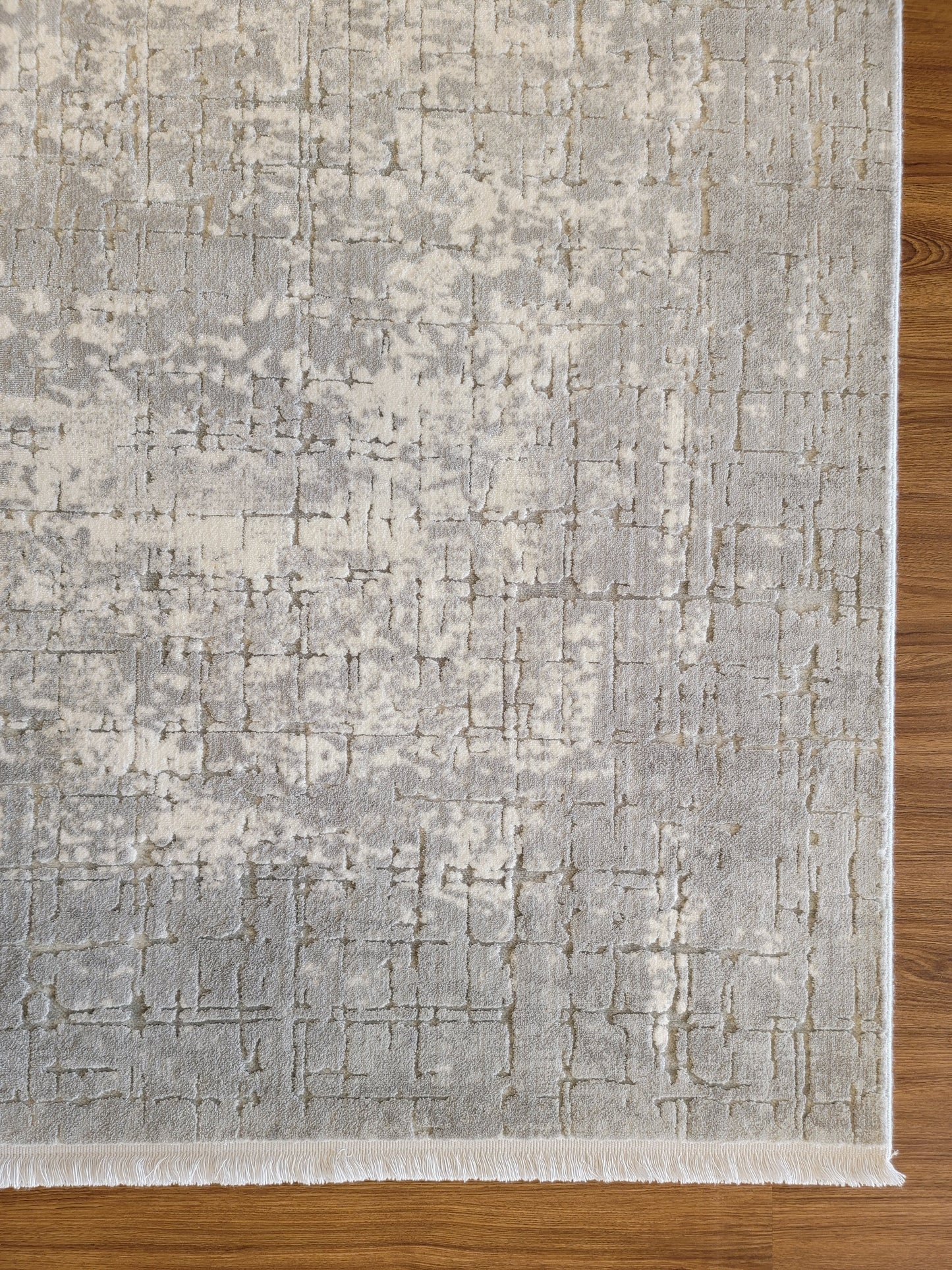 Maxim Abstract Area Rug. White, Platinum, and Ash Gray