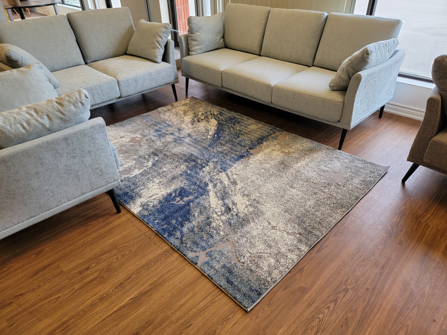 Revero Abstract Area Rug. Ivory, Cobalt Blue, and Gray