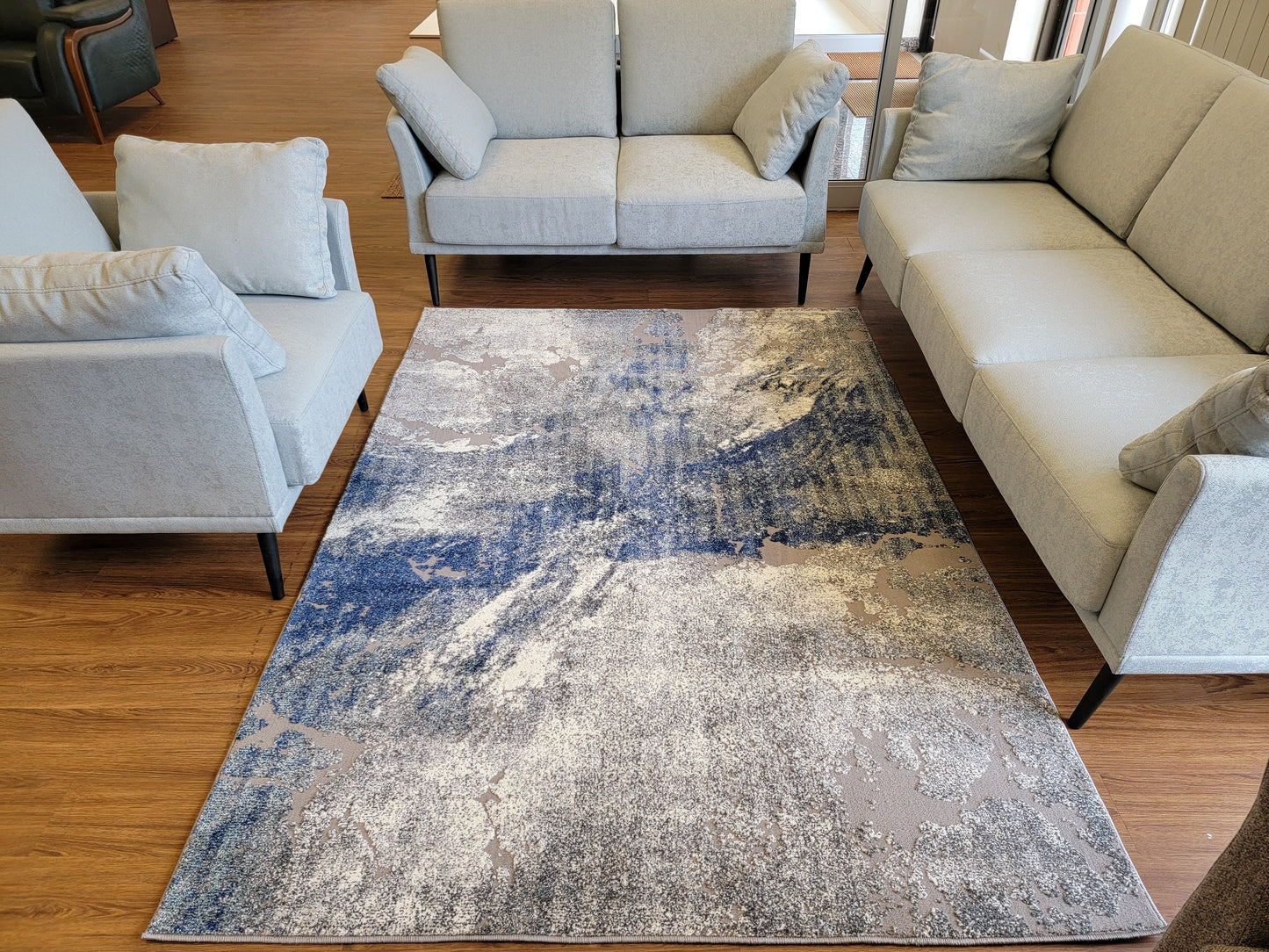 Revero Abstract Area Rug. Ivory, Cobalt Blue, and Gray