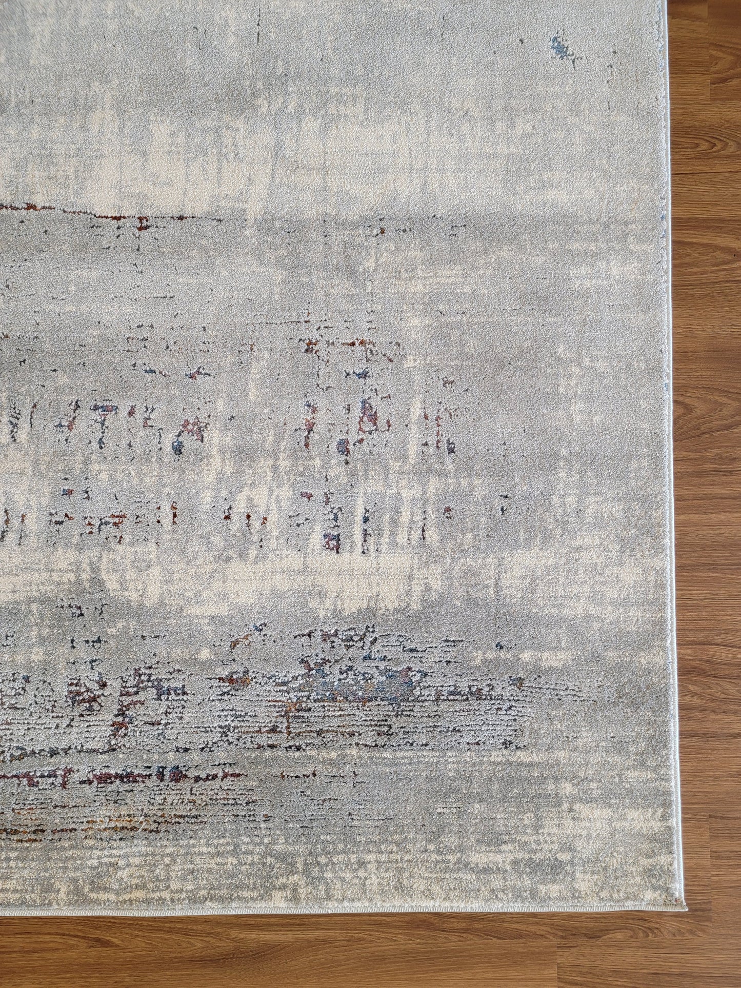 Venus Abstract Area Rug. White, Light Gray, and Blue