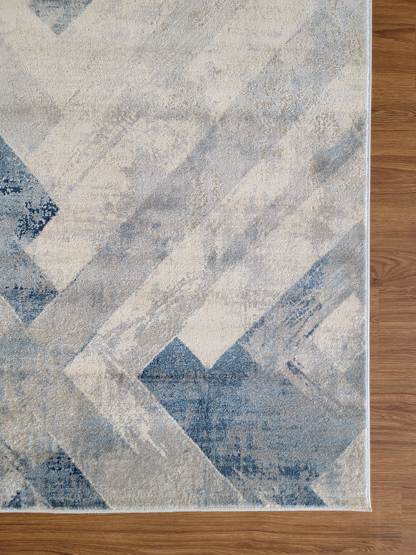 Venus Geometric Area Rug. White, Blue, and Light Gray
