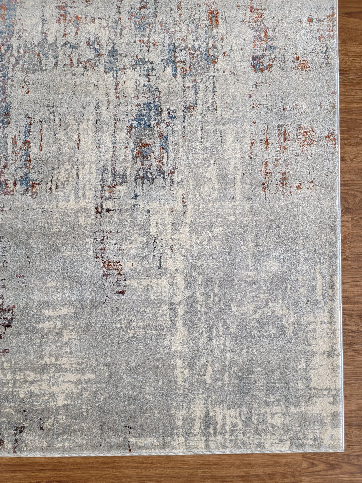 Venus Abstract Area Rug. Light Gray, Dim Gray, and Light Blue