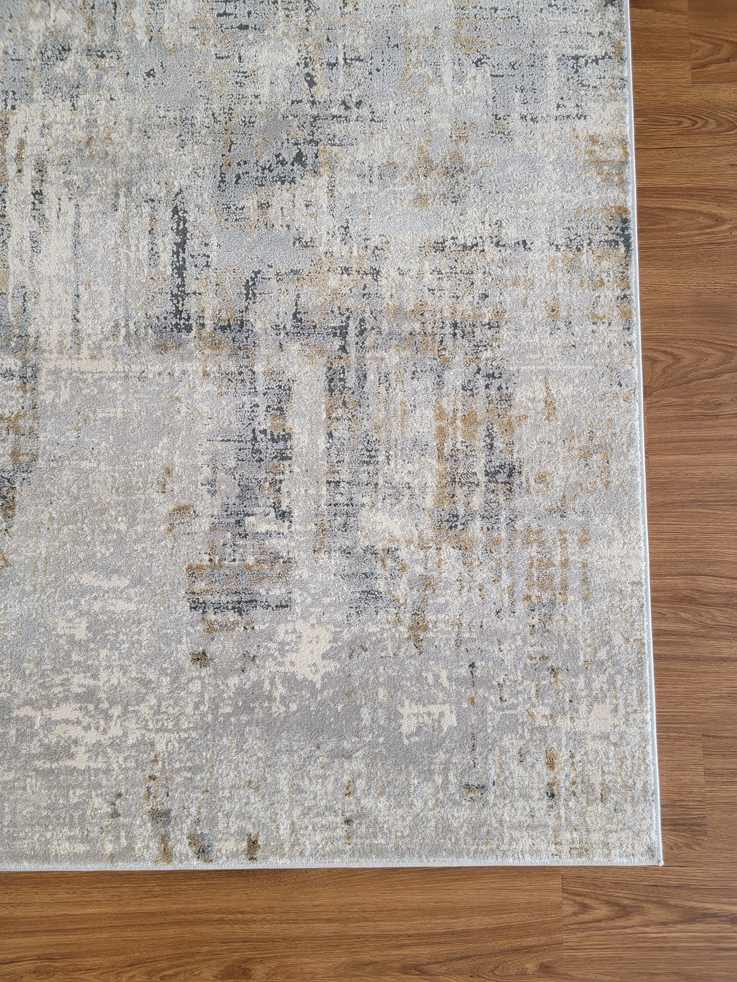 Venus Abstract Area Rug. White and Gray with Light Brown Patches