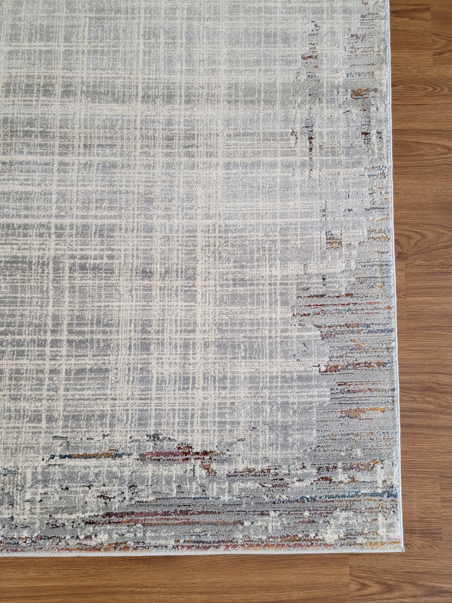 Venus Geometric Area Rug. White and Ash Gray with Patches in Copper